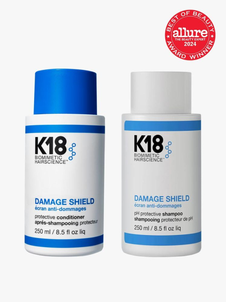 shampoo and conditioner in branded blue and white bottles on light gray background with red and white 2024 allure best of beauty seal